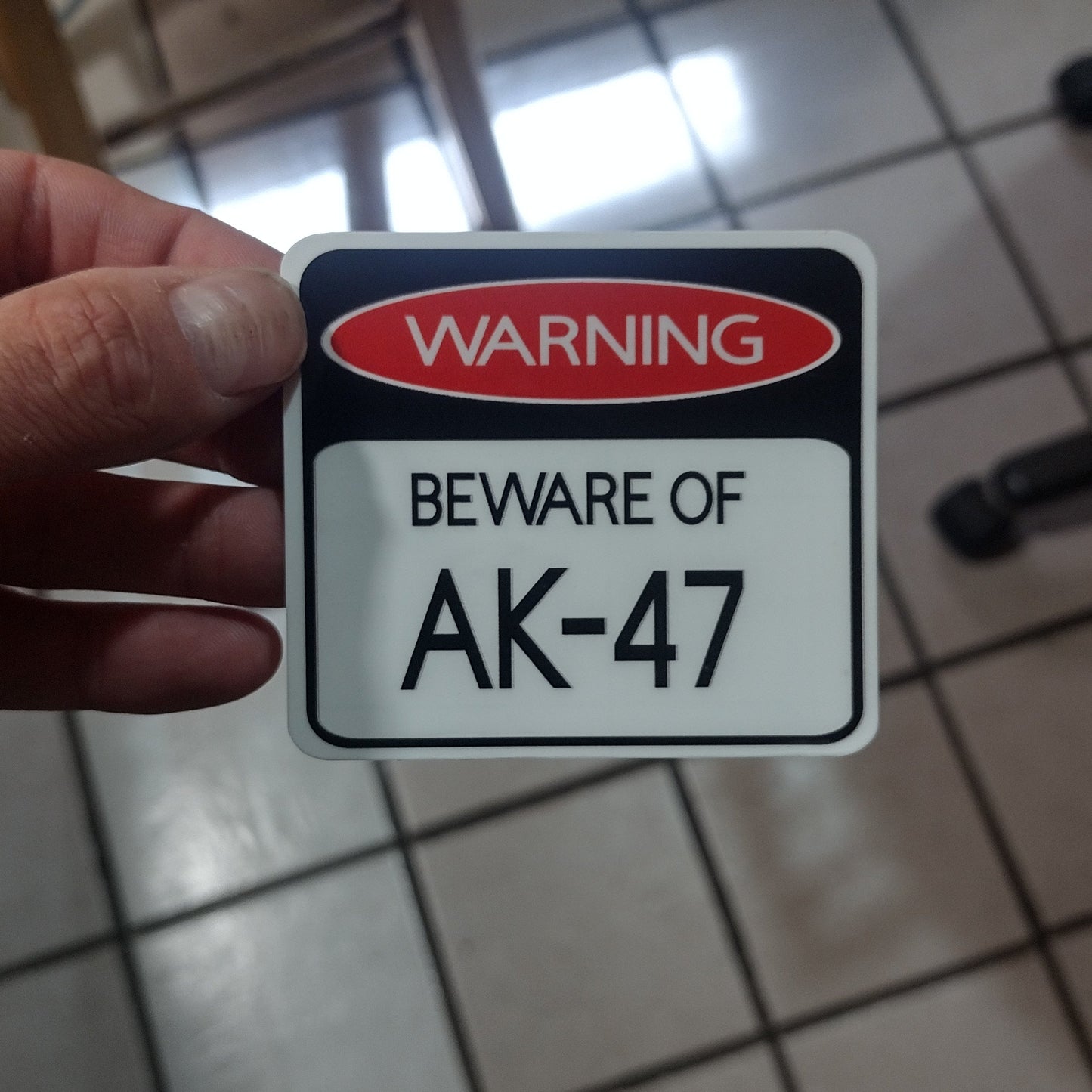 BEWARE of AK-47 (sticker)